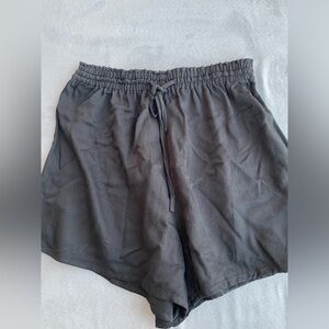 Black H&M shorts in size XS. NWT.